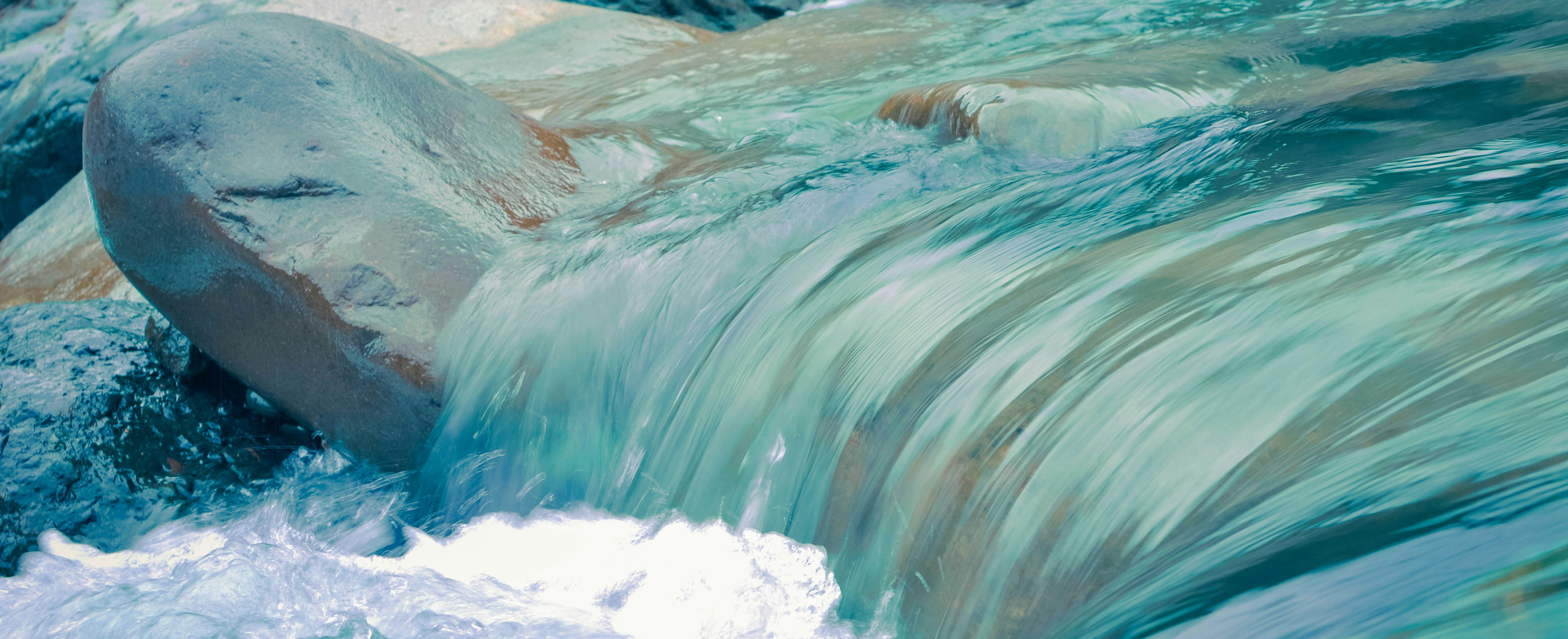 photograph of flowing water in a river